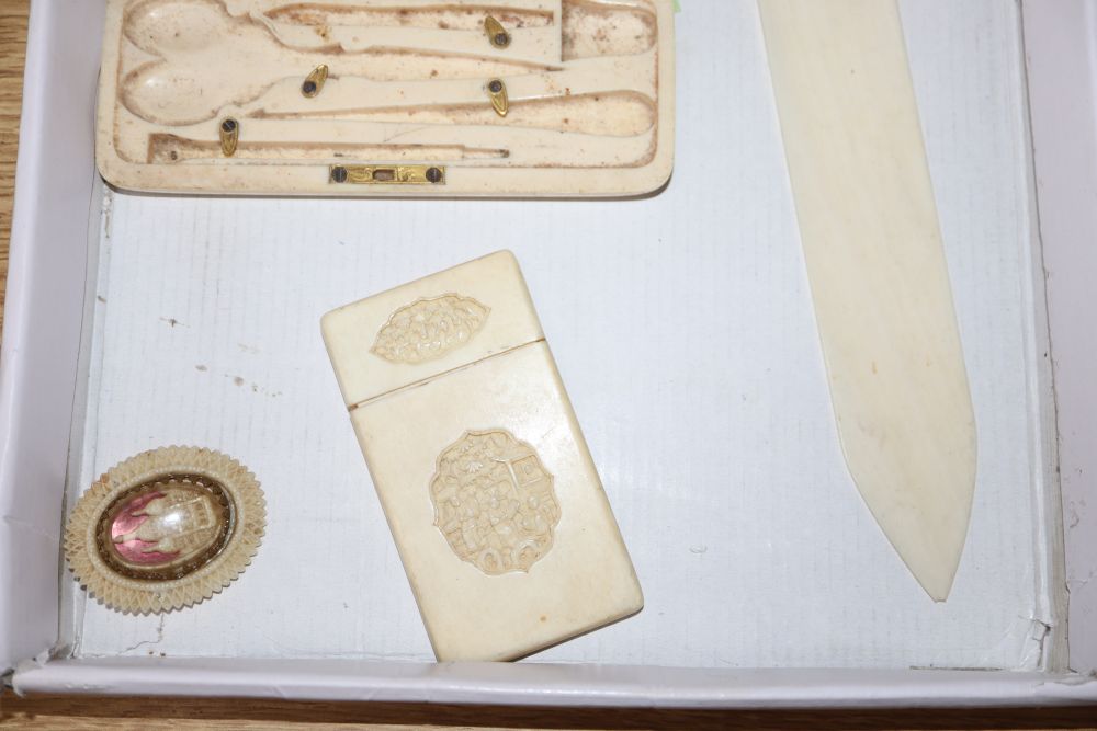 A Canton ivory card case, a page turner, a necessaire case and a pair of Japanese hardwood plaques